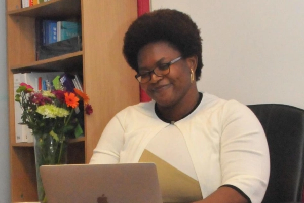 Mary Asante on her laptop at Maysante